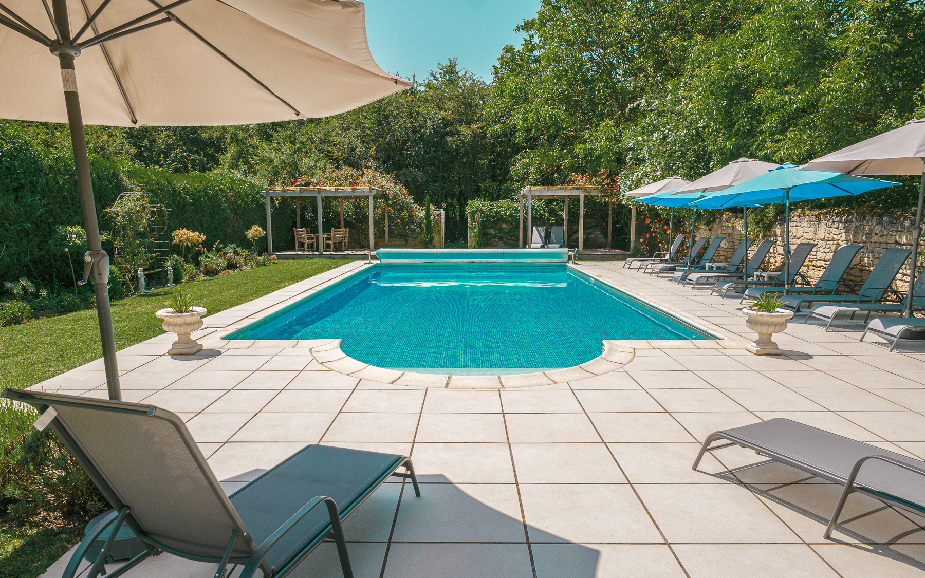 Swimming pool from front gates at Chateau de la Vigne